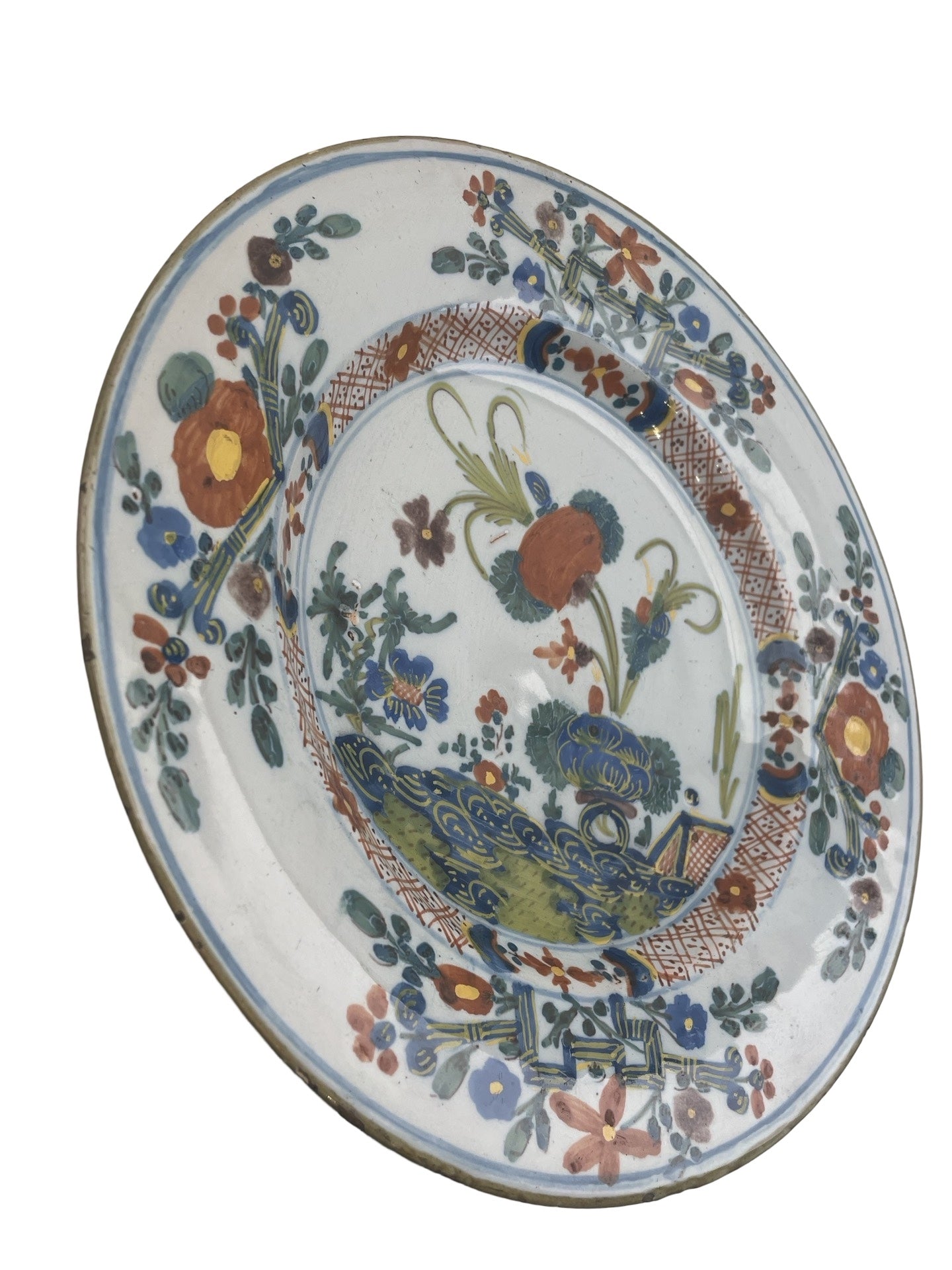 Assiette en faïence – Desvres ou Delft – Décor de fleurs 20e