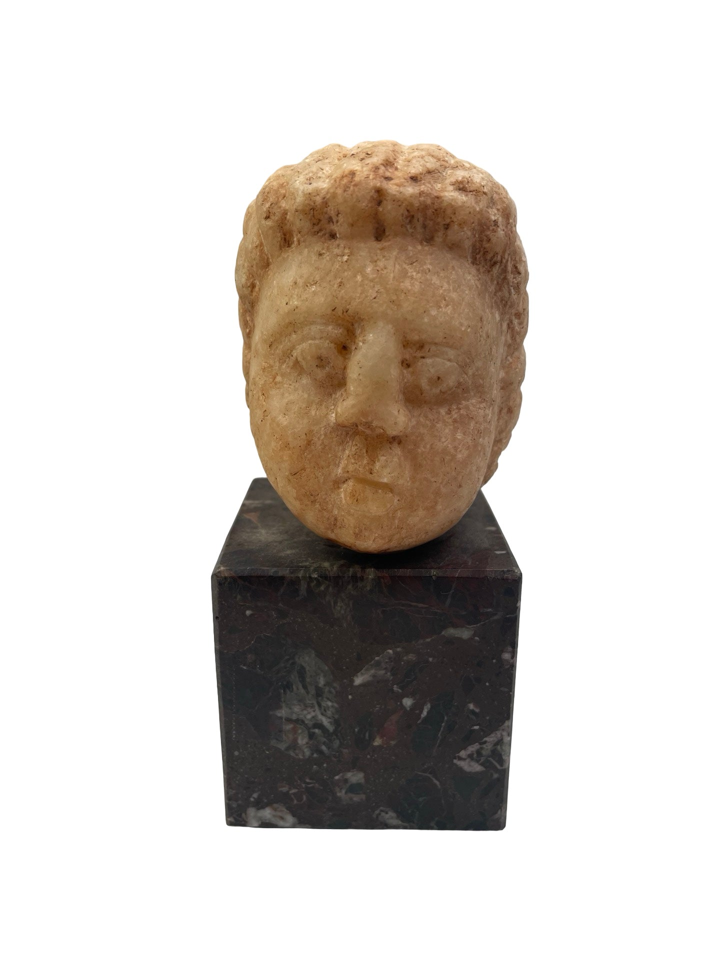 Tête d’enfant en marbre ancien à identifier