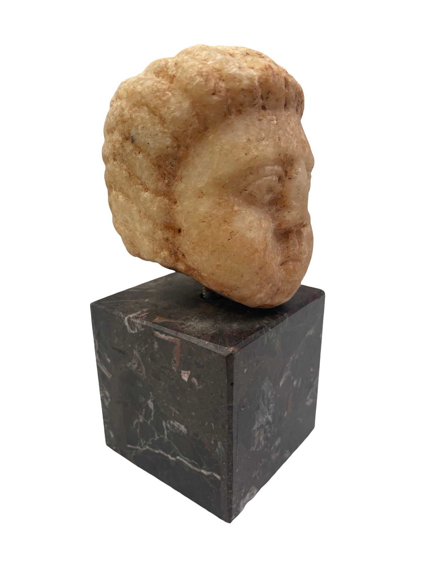 Tête d’enfant en marbre ancien à identifier