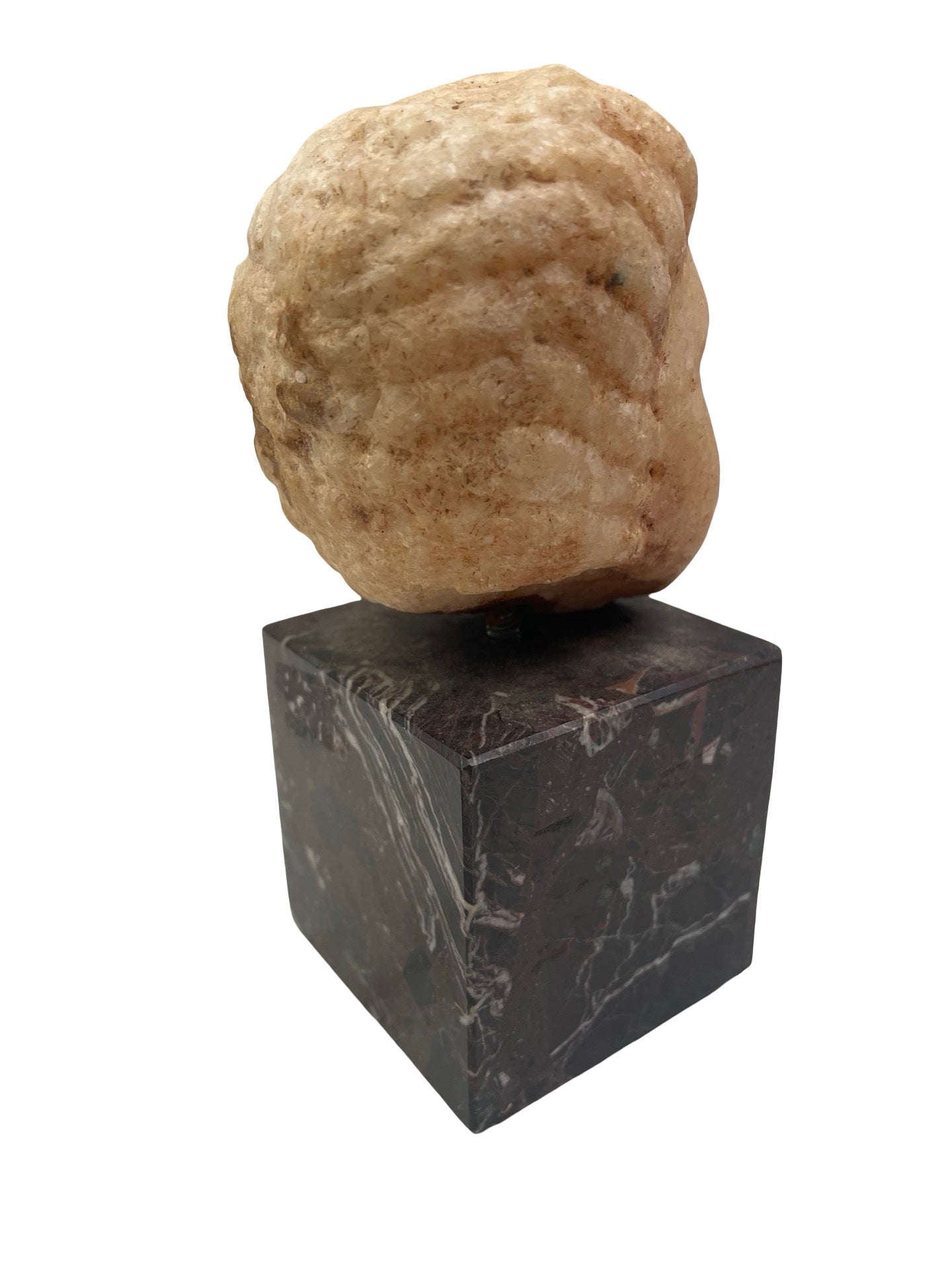 Tête d’enfant en marbre ancien à identifier