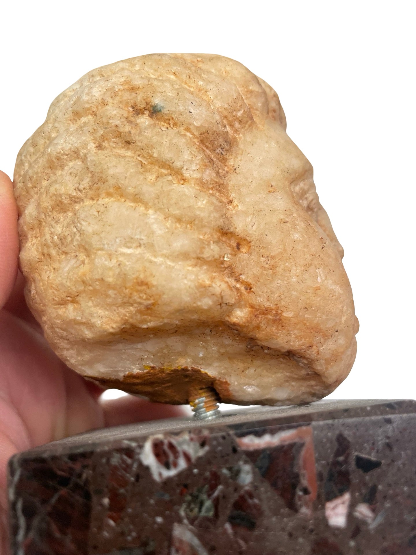 Tête d’enfant en marbre ancien à identifier